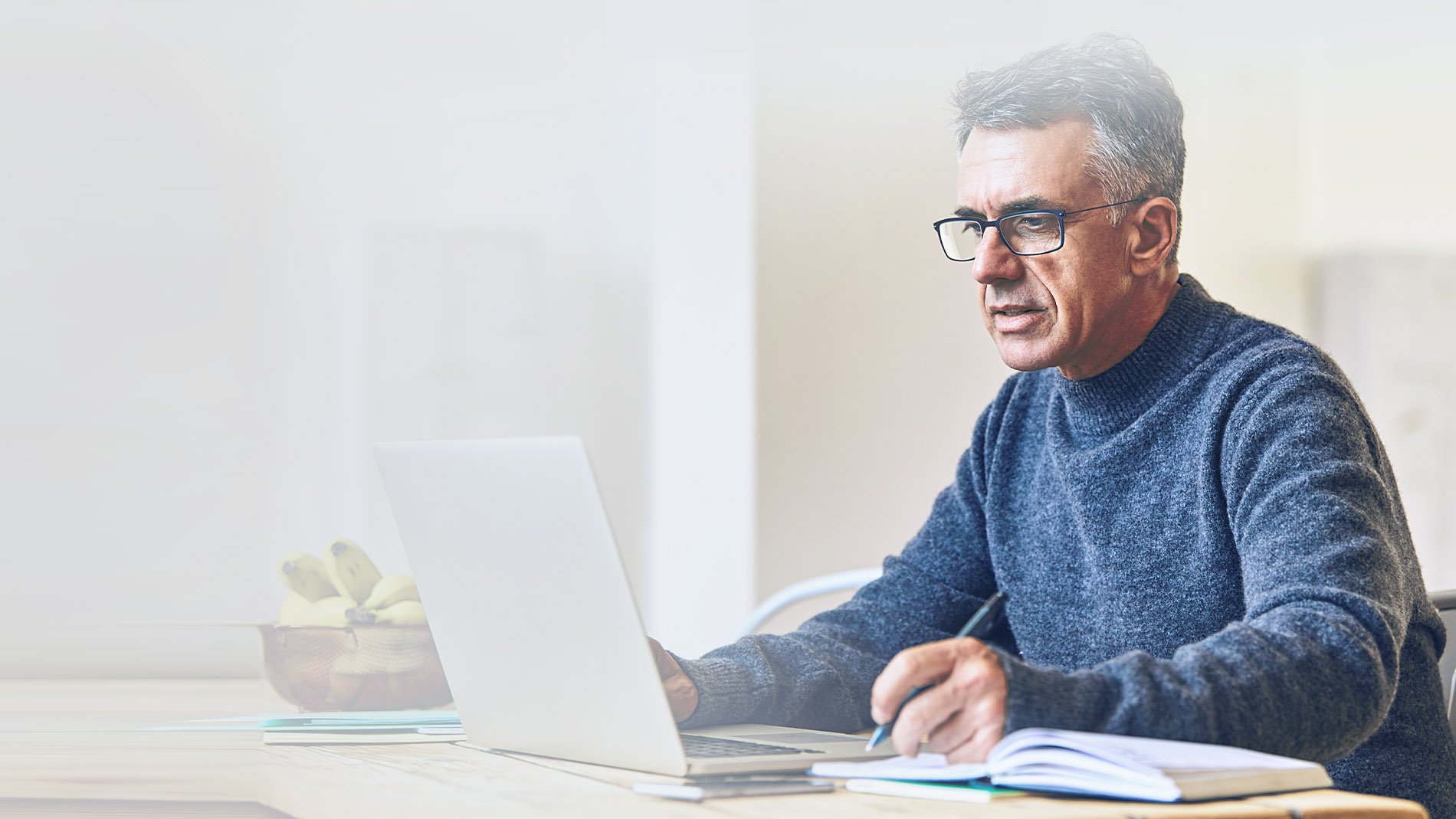 Senior man working at computer