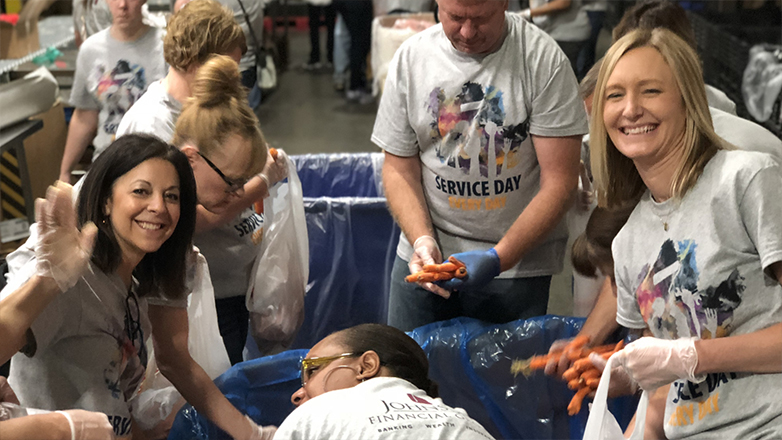 JFG associates volunteering at a local food bank