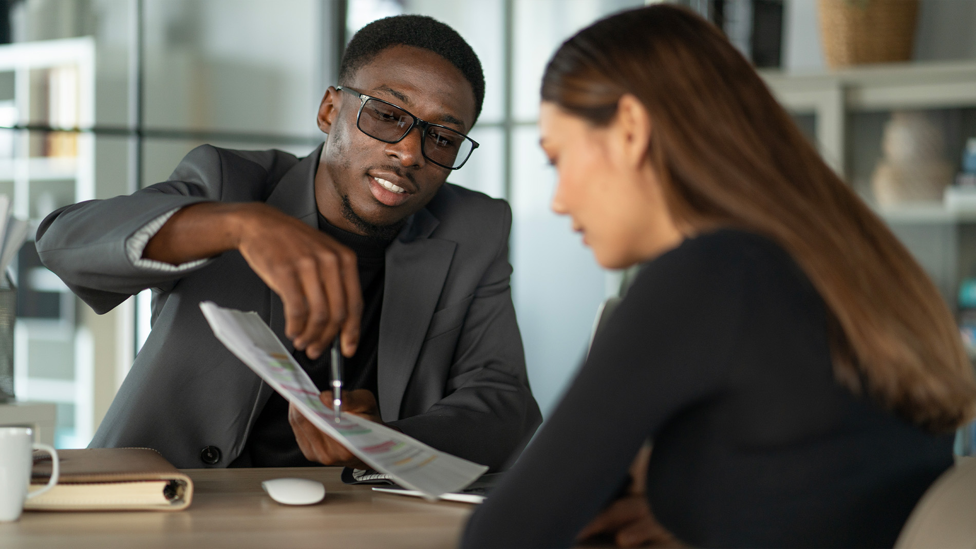 advisor giving financial directions to client