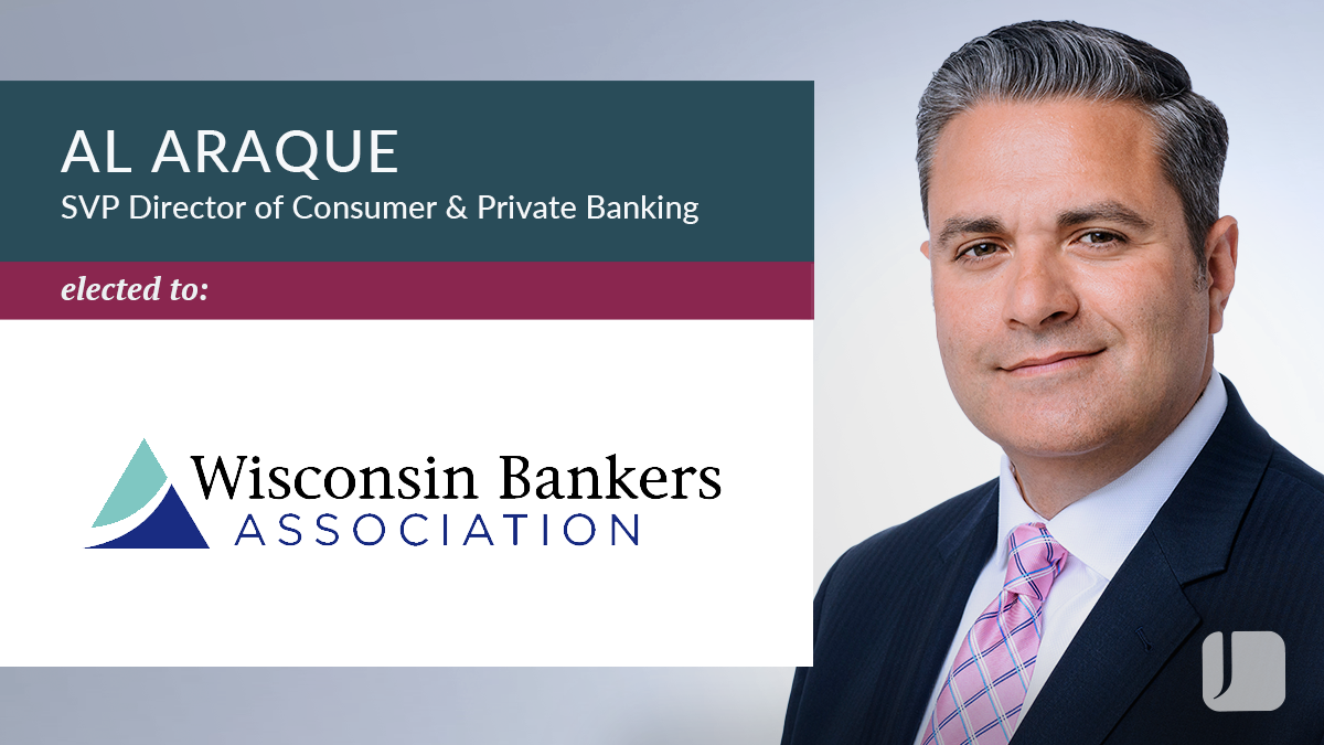 Al Araque next to Wisconsin Bankers Association Logo