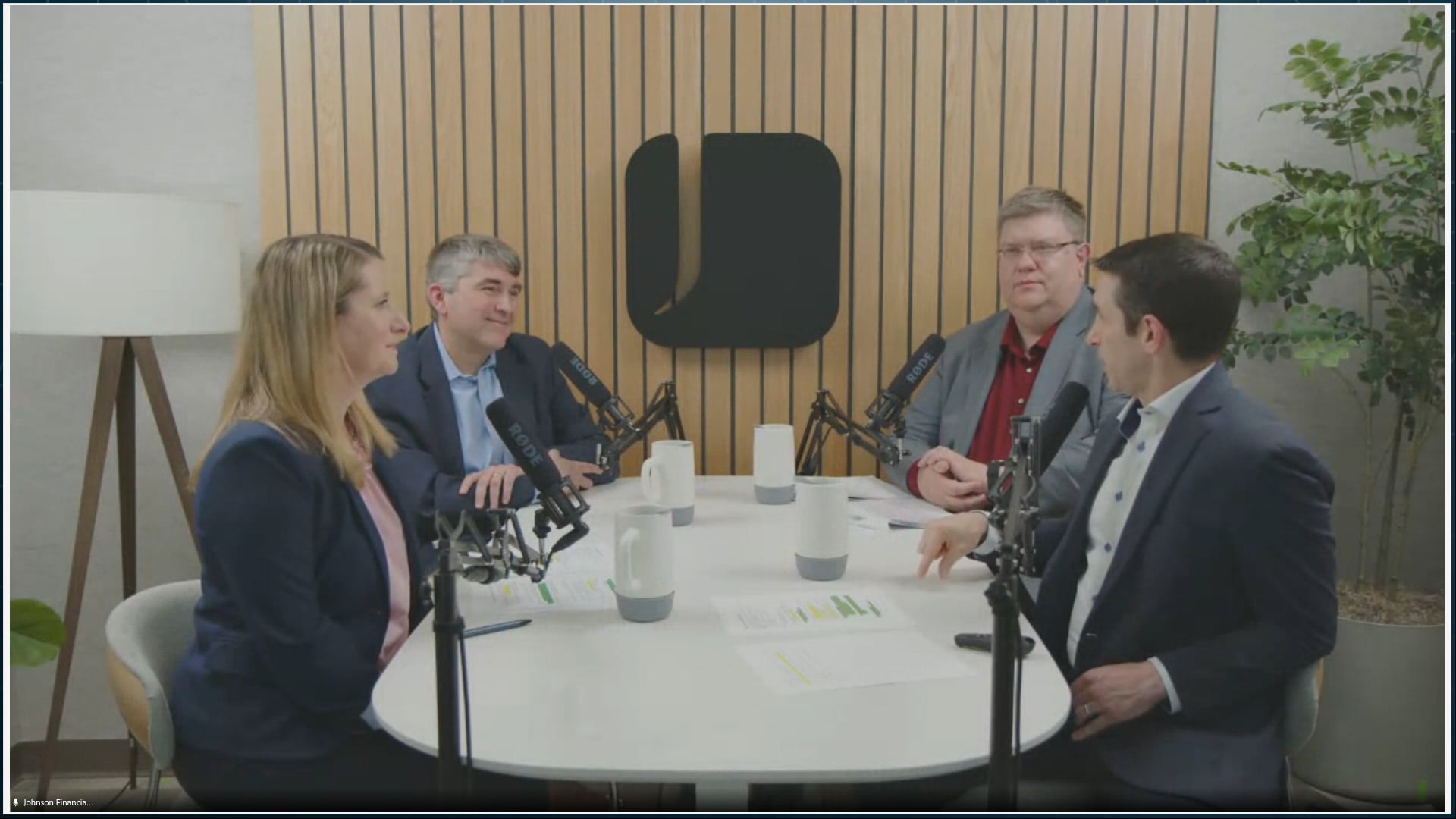 Dominic Ceci, Anisa Dunn, Joe Maier and Kent Demien sitting around a table talking into mics.