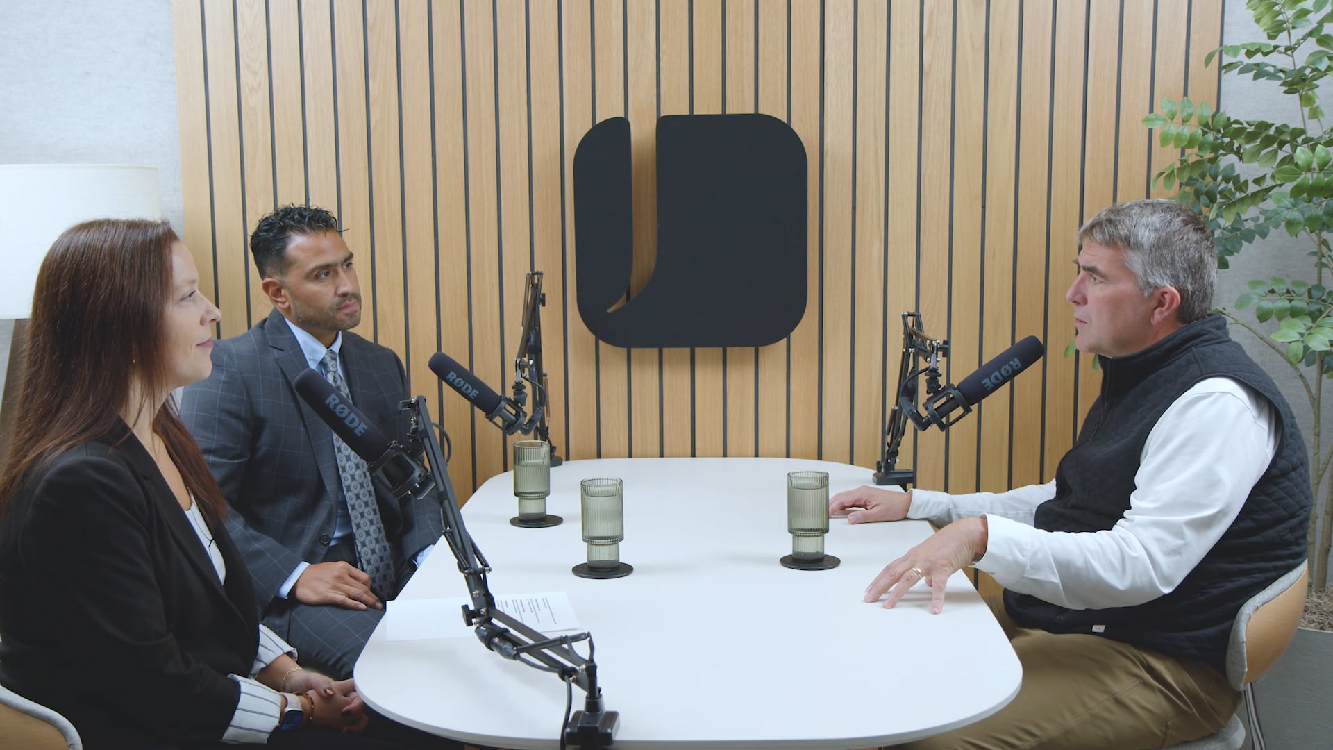 Nicole Farbo, Joe Maier and Eric Bernal in a video studio