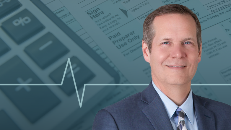 Kyle Tripp headshot overlaid a photo of tax documents