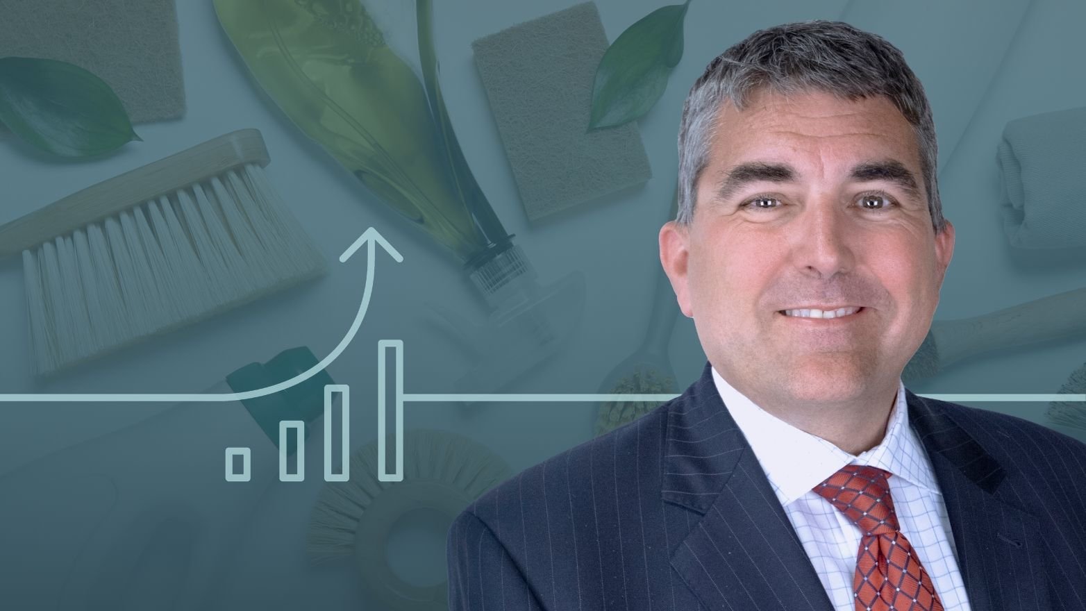 Professional headshot of a smiling man in a suit and tie, with a blue-green background displaying an upward line graph and eco-friendly cleaning supplies.