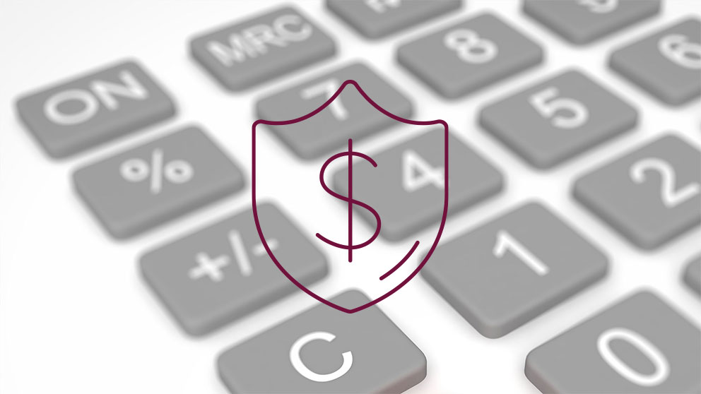 dollar sign inside shield icon over close up calculator