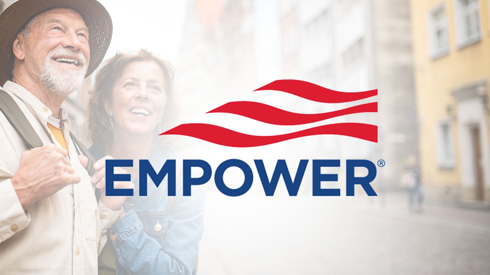 A smiling older couple looks up together, with the Empower logo prominently displayed in front of a blurred cityscape background.