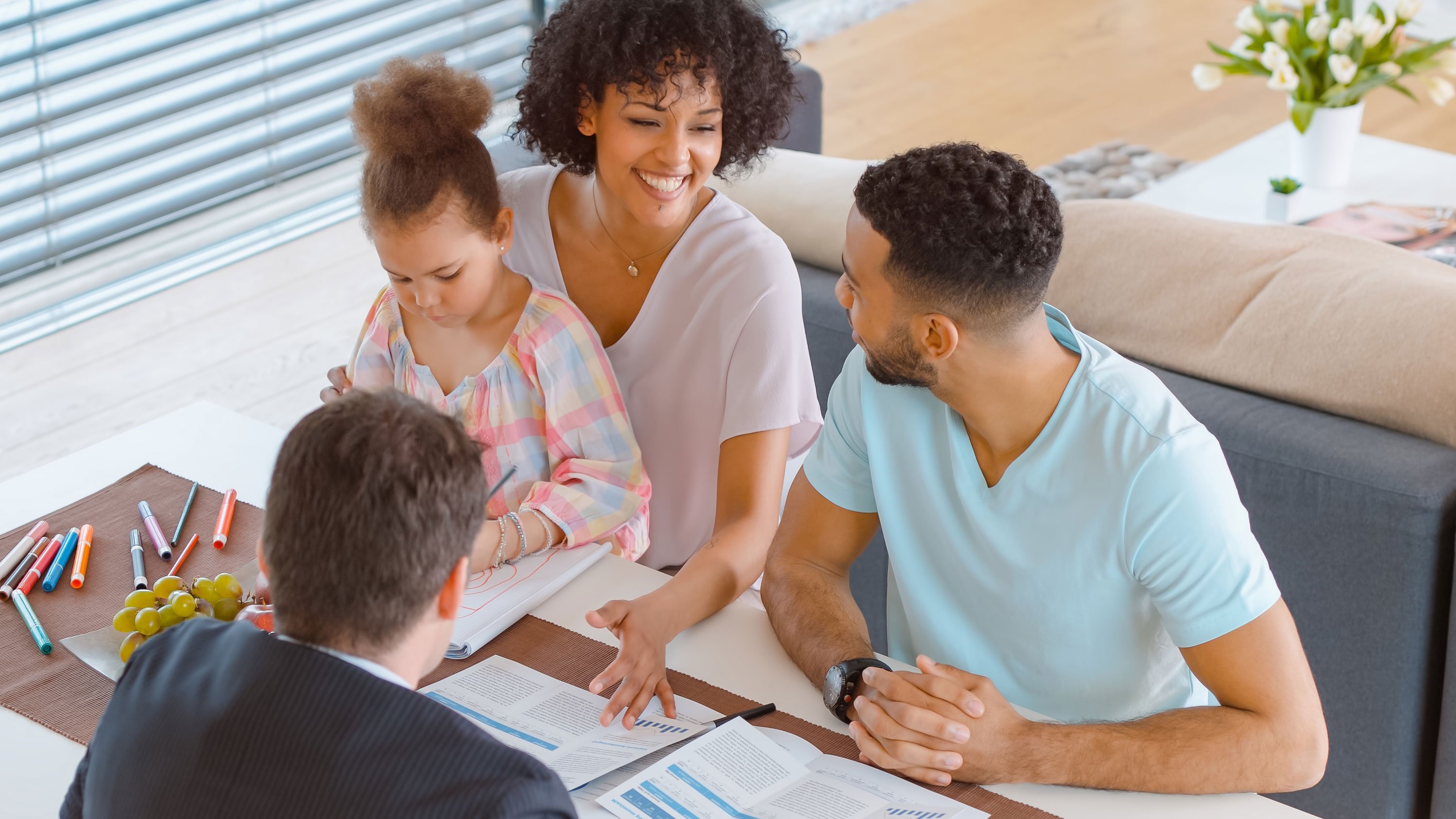 young family meeting with a financial advisor