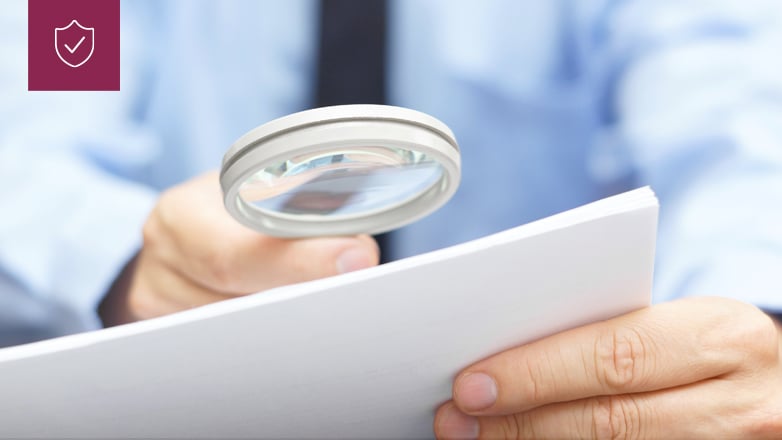 business man magnifying glass