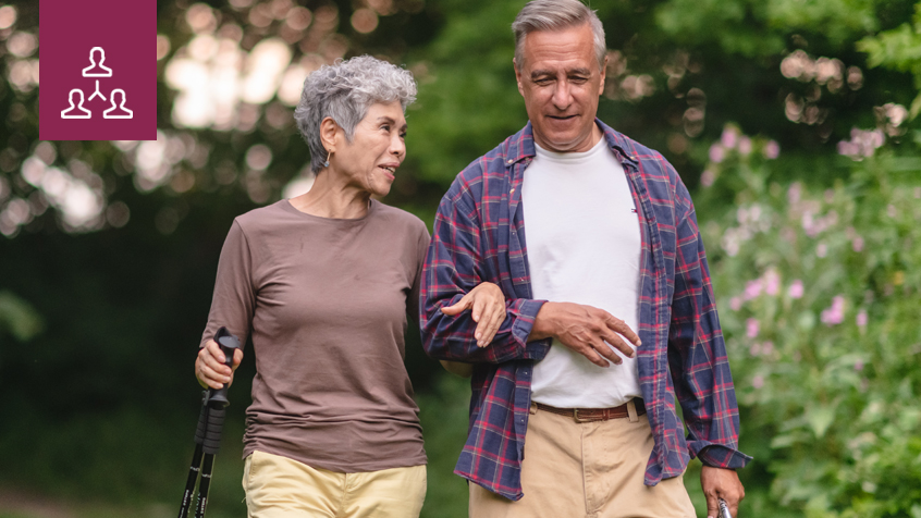 husband and wife walking outside