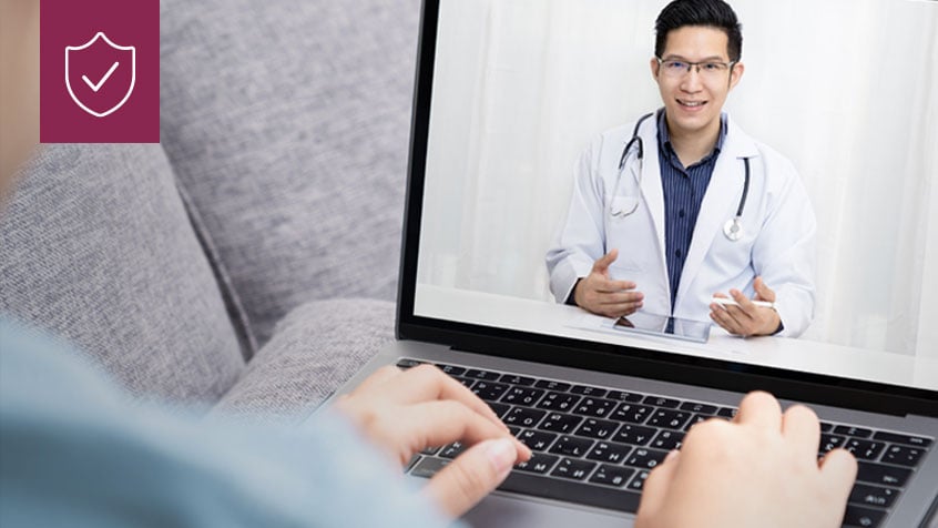 doctor consulting with patient over video chat