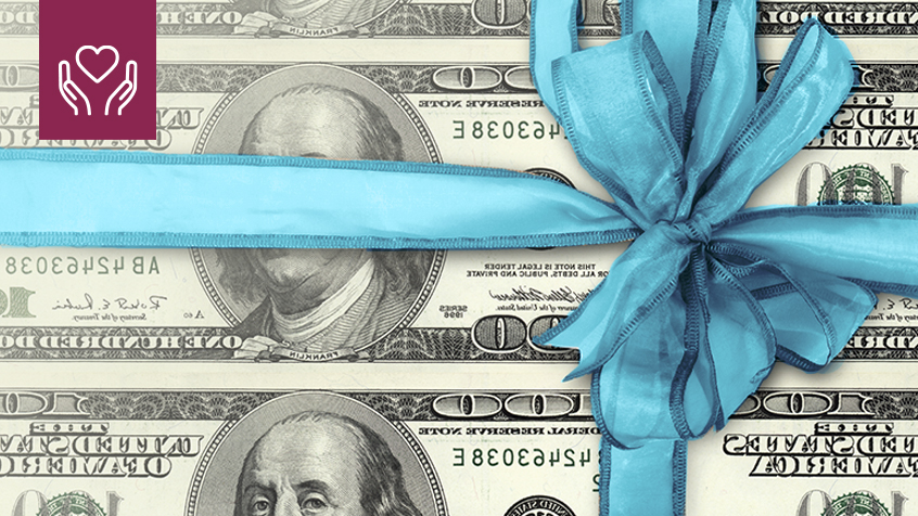 us dollars wrapped in bow