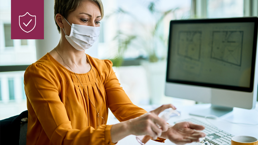 woman mask desk office