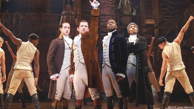 Actors in the famous Broadway show Hamilton pose.